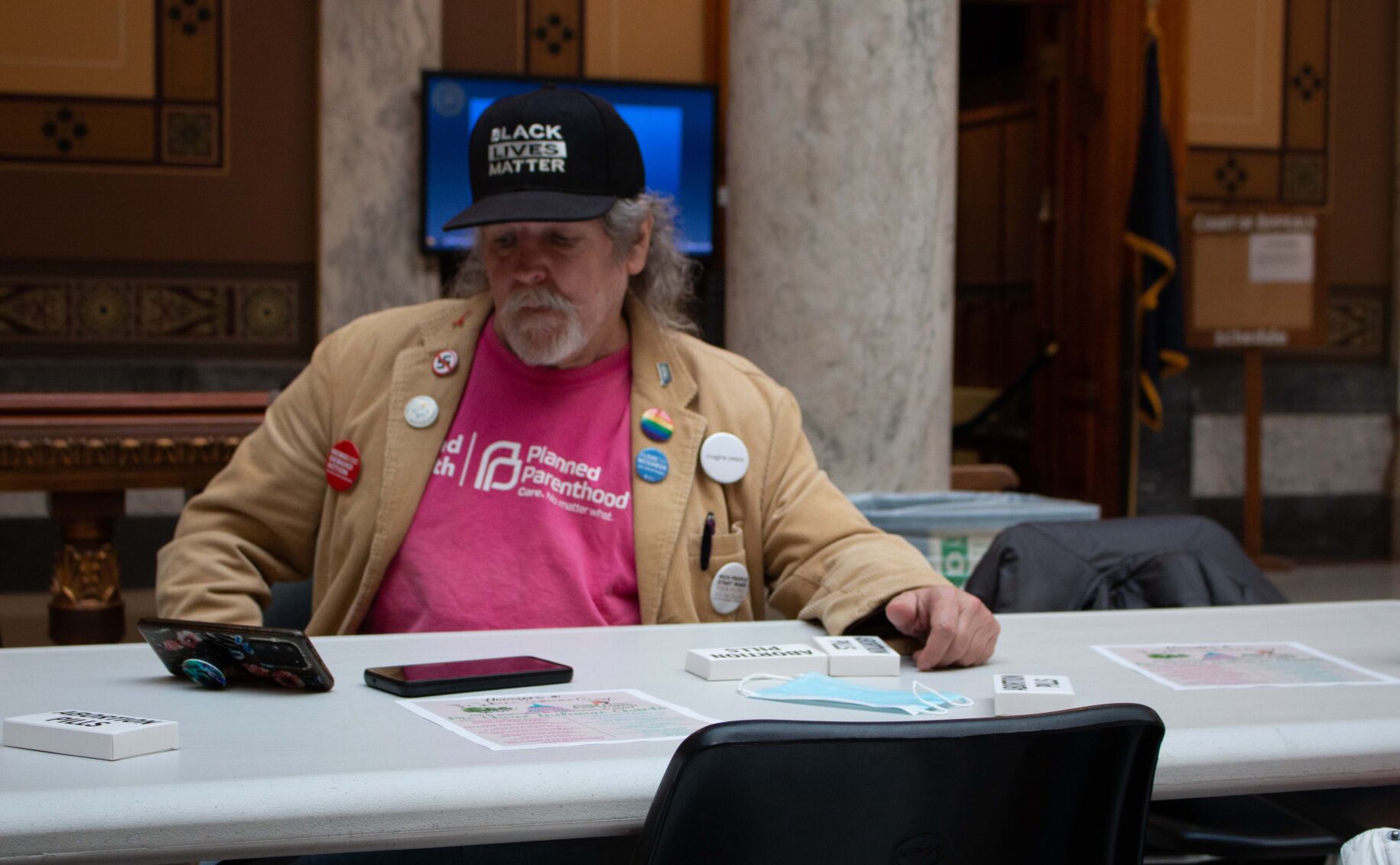 Man Watching Indiana Supreme Court from Phone.jpg
